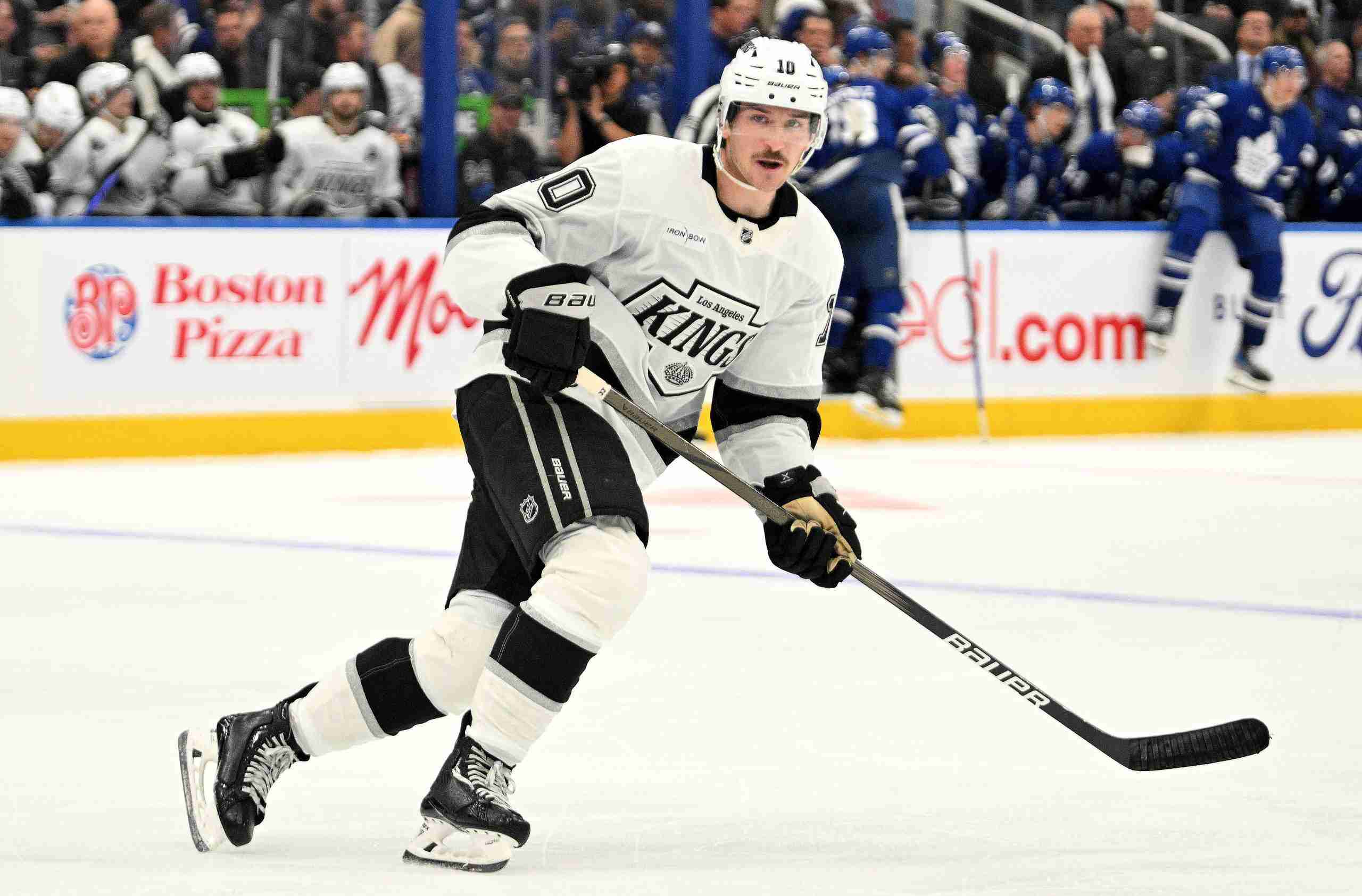 Oct 16, 2024; Toronto, Ontario, CAN; Los Angeles Kings forward Tanner Jeannot (10) pursues the play against the Toronto Maple Leafs in the second period at Scotiabank Arena. Mandatory Credit: Dan Hamilton-Imagn Images