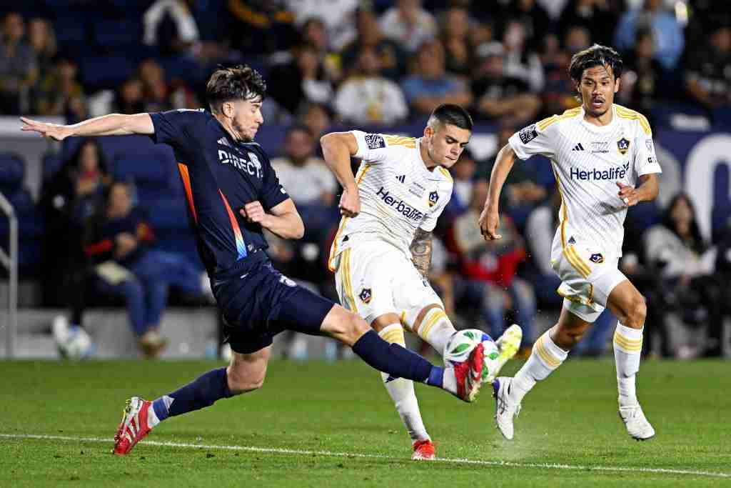 Feb 23, 2025; Carson, California, USA; San Diego FC defender Paddy McNair (17) blocks a shot by LA Galaxy forward Gabriel Pec (11) during the second half at Dignity Health Sports Park. Mandatory Credit: Alex Gallardo-Imagn Images