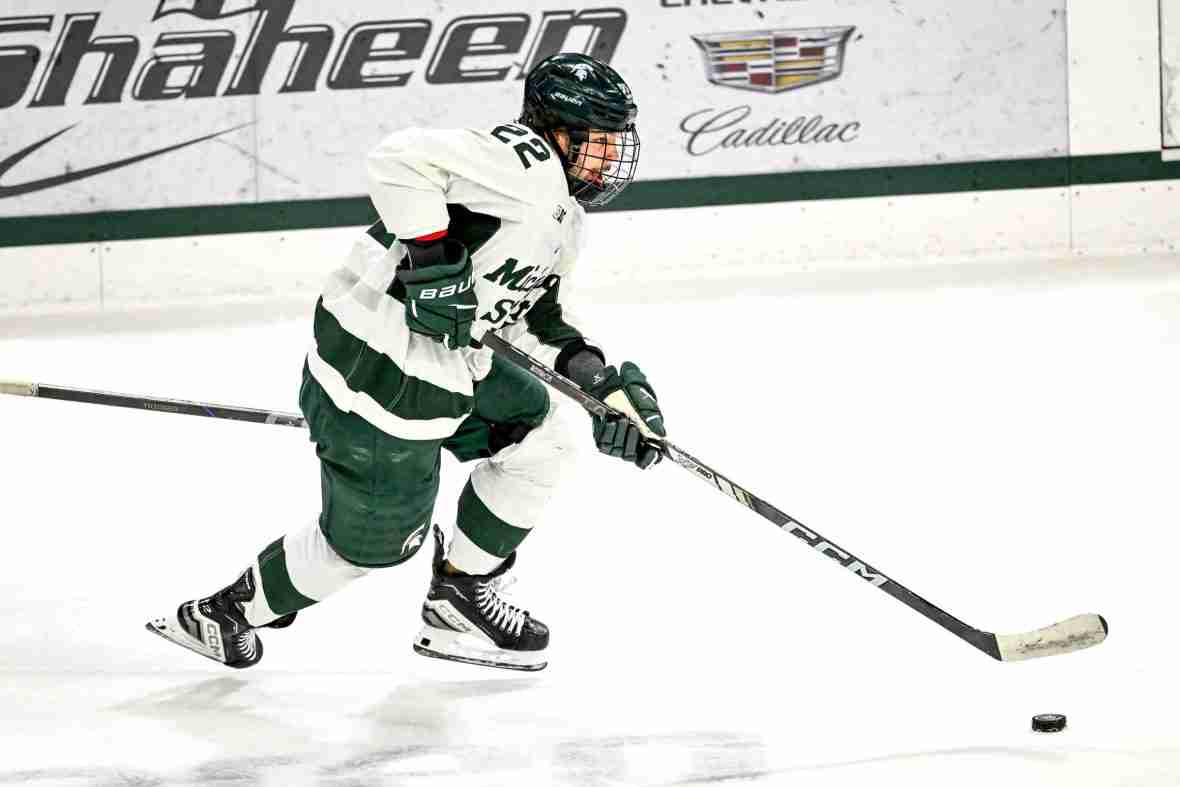 Current image: Michigan State's Isaac Howard moves the puck against Minnesota during the first period on Saturday, Jan. 25, 2025, at Munn Arena in East Lansing.